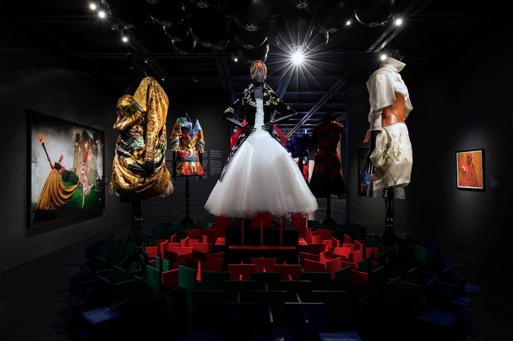 a mannequins in a room with dresses